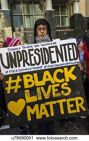 Stock Image - Massive Crowds for Women's March Protesting Donald J. Trump. Fotosearch
