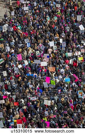 Stock Photography - Massive Crowds for Women's March Protesting Donald J. Trump. Fotosearch