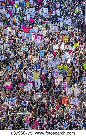 Stock Photography - Massive Crowds for Women's March Protesting Donald J. Trump. Fotosearch