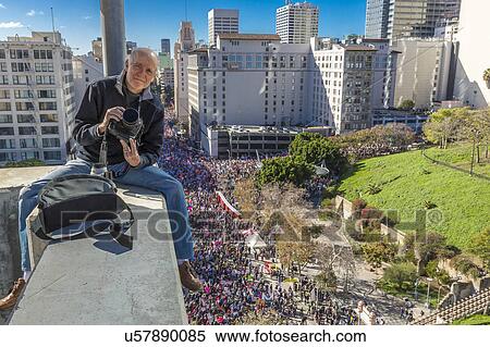 Stock Photography - Massive Crowds for Women's March Protesting Donald J. Trump. Fotosearch