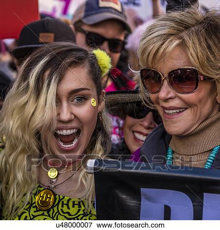 Stock Photo - Miley Cyrus and Jane Fonda participate in Women's March Protesting Donald J. Trump. Fotosearch