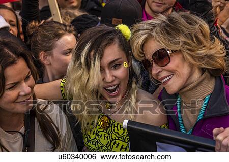 Miley Cyrus and Jane Fonda participate in Women's March Protesting Donald J. Trump View Large Photo Image Stock Photograph - Miley Cyrus and Jane Fonda participate in Women's March Protesting Donald J. Trump. Fotosearch