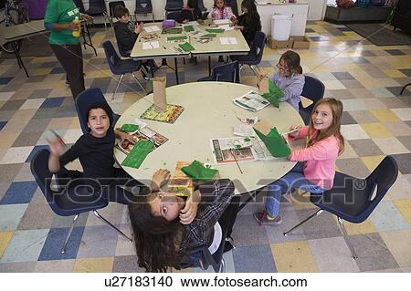 Stock Image - Oak View, California, USA, December 15, children doing finger painting after school. Fotosearch