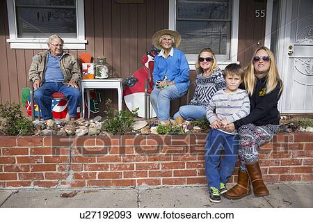 Stock Image - Oak View, California, USA, December 15, the Carr family, 3 generations front porch. Fotosearch
