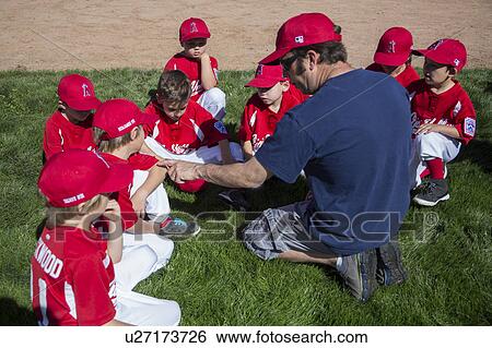 Oak View, California, USA, March 7, 2015, Ojai Valley Little League Field, youth Baseball, Spring, coach teaches Tee-Ball Division players View Large Photo Image Stock Photograph - Oak View, California, USA, March 7, 2015, Ojai Valley Little League Field, youth Baseball, Spring, coach teaches Tee-Ball Division players. Fotosearch