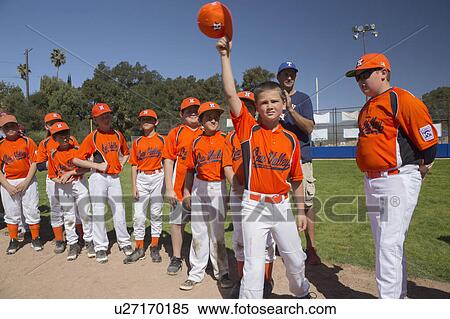 Oak View, California, USA, March 7, 2015, Ojai Valley Little League Field, youth Baseball, Spring, raise their caps when name is announced View Large Photo Image Stock Photography - Oak View, California, USA, March 7, 2015, Ojai Valley Little League Field, youth Baseball, Spring, raise their caps when name is announced. Fotosearch