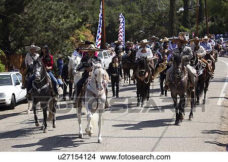 Picture - Oak View, California, USA, May 24, 2015, Memorial Day Parade, hispanic horseback riders. Fotosearch