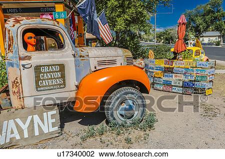 Orange Alien on Main Street in pickup truck, Seligman on historic Route 66, Arizona View Large Photo Image Stock Image - Orange Alien on Main Street in pickup truck, Seligman on historic Route 66, Arizona. Fotosearch