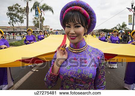 Orange County, City of Westminster, Southern California, USA, February 21, 2015, Little Saigon, Vitenamese-American Community, TET Parade celebrates Tet Lunar New Year, women march in parade View Large Photo Image Stock Image - Orange County, City of Westminster, Southern California, USA, February 21, 2015, Little Saigon, Vitenamese-American Community, TET Parade celebrates Tet Lunar New Year, women march in parade. Fotosearch