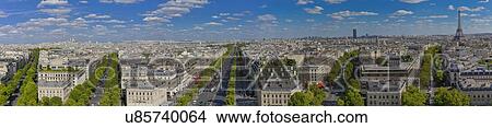 Panoramic Aerial view of Paris, France as seen from the Arch of Triumph on a sunny day with white puffy clouds View Large Photo Image Picture - Panoramic Aerial view of Paris, France as seen from the Arch of Triumph on a sunny day with white puffy clouds. Fotosearch