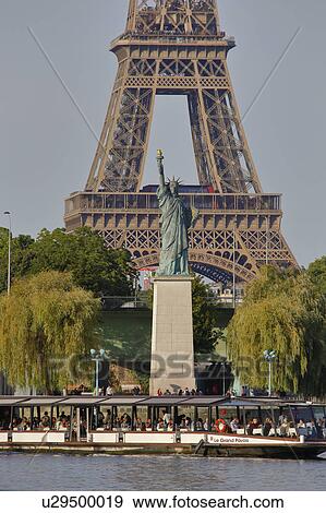 Replica of the Statue of Liberty and Eiffel Tower, view from the River Seine - Paris, France View Large Photo Image Stock Photo - Replica of the Statue of Liberty and Eiffel Tower, view from the River Seine - Paris, France. Fotosearch