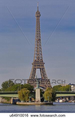 Replica of the Statue of Liberty and Eiffel Tower, view from the River Seine - Paris, France View Large Photo Image Stock Photograph - Replica of the Statue of Liberty and Eiffel Tower, view from the River Seine - Paris, France. Fotosearch