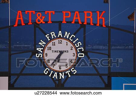 Picture - San Francisco, California, USA, October 16, 2014, AT&T Park, baseball stadium, SF Giants versus St. Louis Cardinals, National League Championship Series (NLCS), AT&T Park neon and clock. Fotosearch