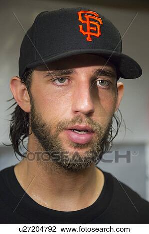 Stock Image - San Francisco, California, USA, October 16, 2014, AT&T Park, baseball stadium, SF Giants versus St. Louis Cardinals, National League Championship Series (NLCS), pitcher Brent Musburger, Series MVP, dugout celebration. Fotosearch