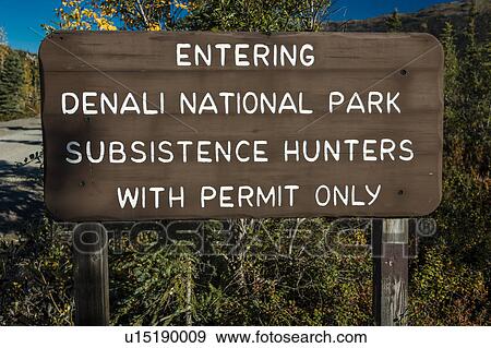 Stock Photo - Sign reads "End of the Road Mile 92. 5" - Denali National Park, Kantishna, Alaska. Fotosearch