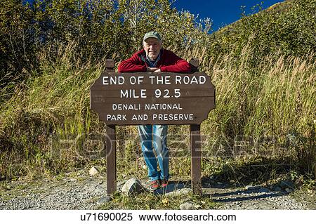 Stock Photography - Sign reads "End of the Road Mile 92. 5" - Denali National Park, Kantishna, Alaska. Fotosearch