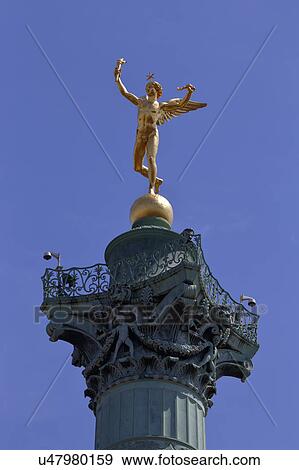Stock Photo - Statue of 'Genie de la Bastille' (Bastille genius), a golden bronze by French Jacques Edme Dumont, on the top of the July Column statue at the Bastille square, Paris France. Fotosearch