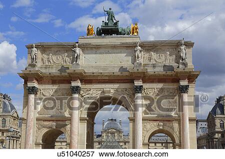 Stock Photo - The Arc de Triomphe de Carrousel outside the Louvre in Paris. . Fotosearch