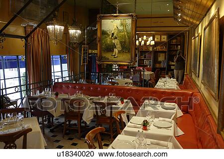 Stock Image - The Cafe Procope in Paris, France - historic cafe where Ben Franklin, Voltaire and others attended. Fotosearch
