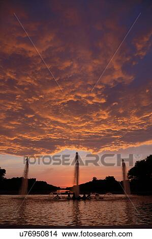Picture - The Grand Canal Fountains of Chateau de Versailles at sunset, the estate of Versaille home of Louis XIV, France. Fotosearch