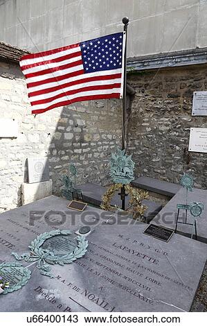 Stock Image - Tombstone of General Marquis Lafayette and his wife, Picpus Historical Cemetery, Paris, France. Fotosearch