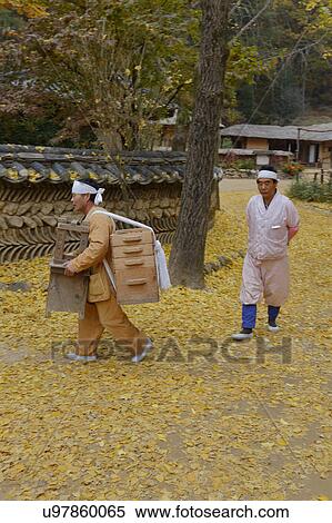 Stock Photography - Traditional ethnic folk people at Namsangol traditional folk village, Seoul, South Korea. Fotosearch