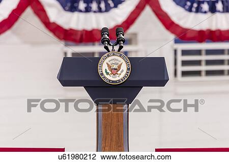 Stock Image - Vice Presidential Seal and Empty Podium, awaiting Vice President Joe Biden Speech. Fotosearch