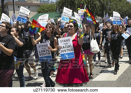West Hollywood, Los Angeles, California, USA, June 14, 2015, 40th annual Gay Pride Parade for LGBT Community, down Santa Monica Blvd., stand for Racial Justice signs View Large Photo Image Stock Image - West Hollywood, Los Angeles, California, USA, June 14, 2015, 40th annual Gay Pride Parade for LGBT Community, down Santa Monica Blvd., stand for Racial Justice signs. Fotosearch