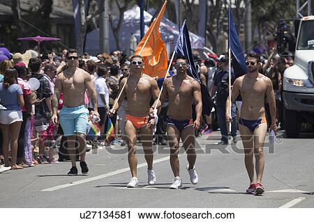 West Hollywood, Los Angeles, California, USA, June 14, 2015, 40th annual Gay Pride Parade for LGBT Community, down Santa Monica Blvd., gay shirtless males marching in parade View Large Photo Image Stock Image - West Hollywood, Los Angeles, California, USA, June 14, 2015, 40th annual Gay Pride Parade for LGBT Community, down Santa Monica Blvd., gay shirtless males marching in parade. Fotosearch