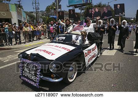 West Hollywood, Los Angeles, California, USA, June 14, 2015, 40th annual Gay Pride Parade for LGBT Community, down Santa Monica Blvd., attorney Gloria Allred with Supreme Court Justices on posters View Large Photo Image Stock Photo - West Hollywood, Los Angeles, California, USA, June 14, 2015, 40th annual Gay Pride Parade for LGBT Community, down Santa Monica Blvd., attorney Gloria Allred with Supreme Court Justices on posters. Fotosearch