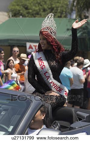 Stock Photo - West Hollywood, Los Angeles, California, USA, June 14, 2015, 40th annual Gay Pride Parade for LGBT Community, down Santa Monica Blvd., Ms LA Pride waves. Fotosearch