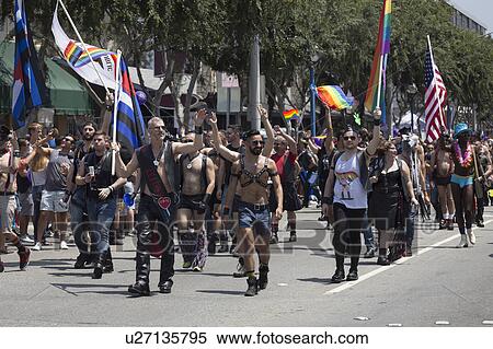 Stock Photography - West Hollywood, Los Angeles, California, USA, June 14, 2015, 40th annual Gay Pride Parade for LGBT Community, down Santa Monica Blvd., gay men in black leather. Fotosearch