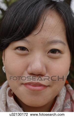Young woman poses - South Korea, National Capital Area, Seoul View Large Photo Image Stock Image - Young woman poses - South Korea, National Capital Area, Seoul. Fotosearch