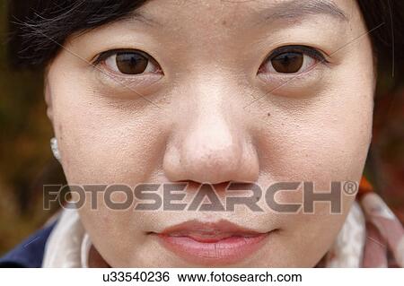 Young woman poses - South Korea, National Capital Area, Seoul View Large Photo Image Stock Photograph - Young woman poses - South Korea, National Capital Area, Seoul. Fotosearch