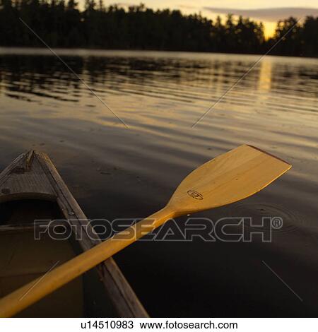 Boat oar in a boat on Lake of the woods, Ontario, Canada View Large Photo Image Stock Image - Boat oar in a boat on Lake of the woods, Ontario, Canada. Fotosearch