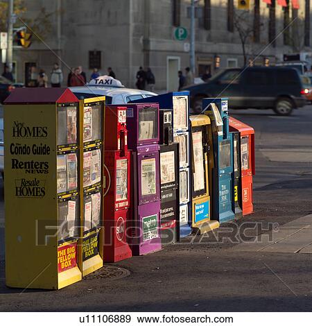 Stock Photo - Newspapers City Center Toronto Ontario Canada. Fotosearch