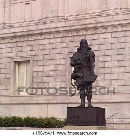 Stock Image - Statue by Building in San Francisco. Fotosearch