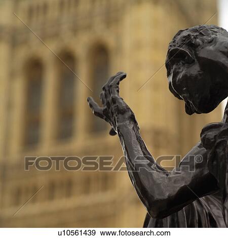 Stone statue of a man outside the house of parliament in London, England View Large Photo Image Stock Photo - Stone statue of a man outside the house of parliament in London, England. Fotosearch