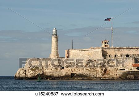View of a fort and lighthouse on the seafront, Havana, Cuba View Large Photo Image Stock Photo - View of a fort and lighthouse on the seafront, Havana, Cuba. Fotosearch