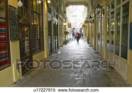 Alleyway of shops and restaurants, Paris, France View Large Photo Image Stock Photography - Alleyway of shops and restaurants, Paris, France. Fotosearch