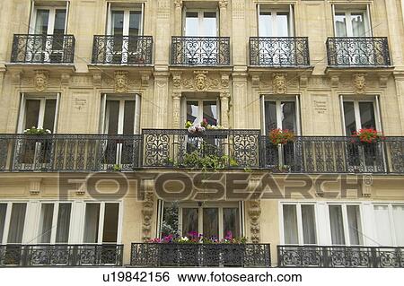 Stock Photograph - Balconies of Paris apartment building. Fotosearch