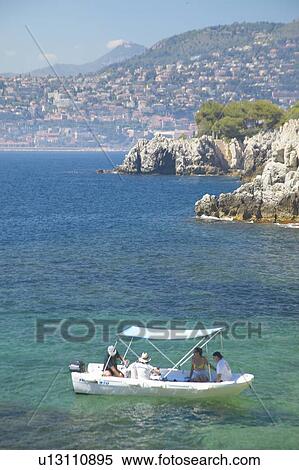 Boaters near Saint Jean Cap Ferrat, French Riviera, France View Large Photo Image Stock Photography - Boaters near Saint Jean Cap Ferrat, French Riviera, France. Fotosearch