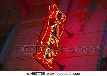 Stock Photo - Café neon sign at night, France. Fotosearch