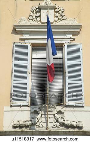 French flag flying from window View Large Photo Image Stock Photo - French flag flying from window. Fotosearch