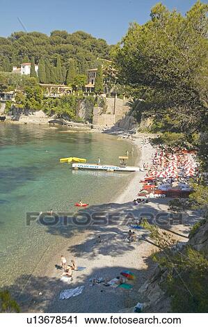 Sunbathers on Patoma Beach, near Villefranche sur Mer, French Riviera, France View Large Photo Image Stock Image - Sunbathers on Patoma Beach, near Villefranche sur Mer, French Riviera, France. Fotosearch