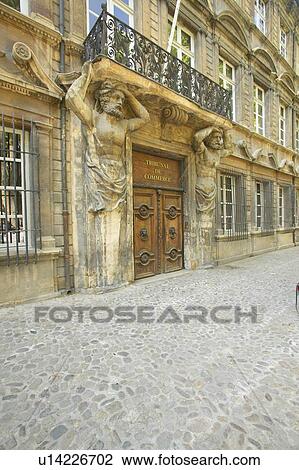 Stock Image - Tribunal de Commerce front door. Fotosearch
