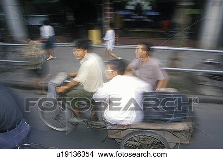 Bicycle riders View Large Photo Image Picture - Bicycle riders . Fotosearch