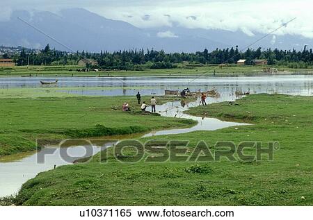 Stock Photography - Fishermen on Lake. Fotosearch