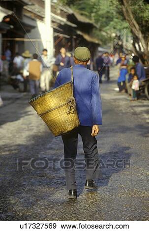 Stock Photo - Man with basket . Fotosearch