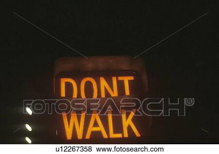 A sign that reads “Don't Walk” View Large Photo Image Stock Photo - A sign that reads “Don't Walk”. Fotosearch